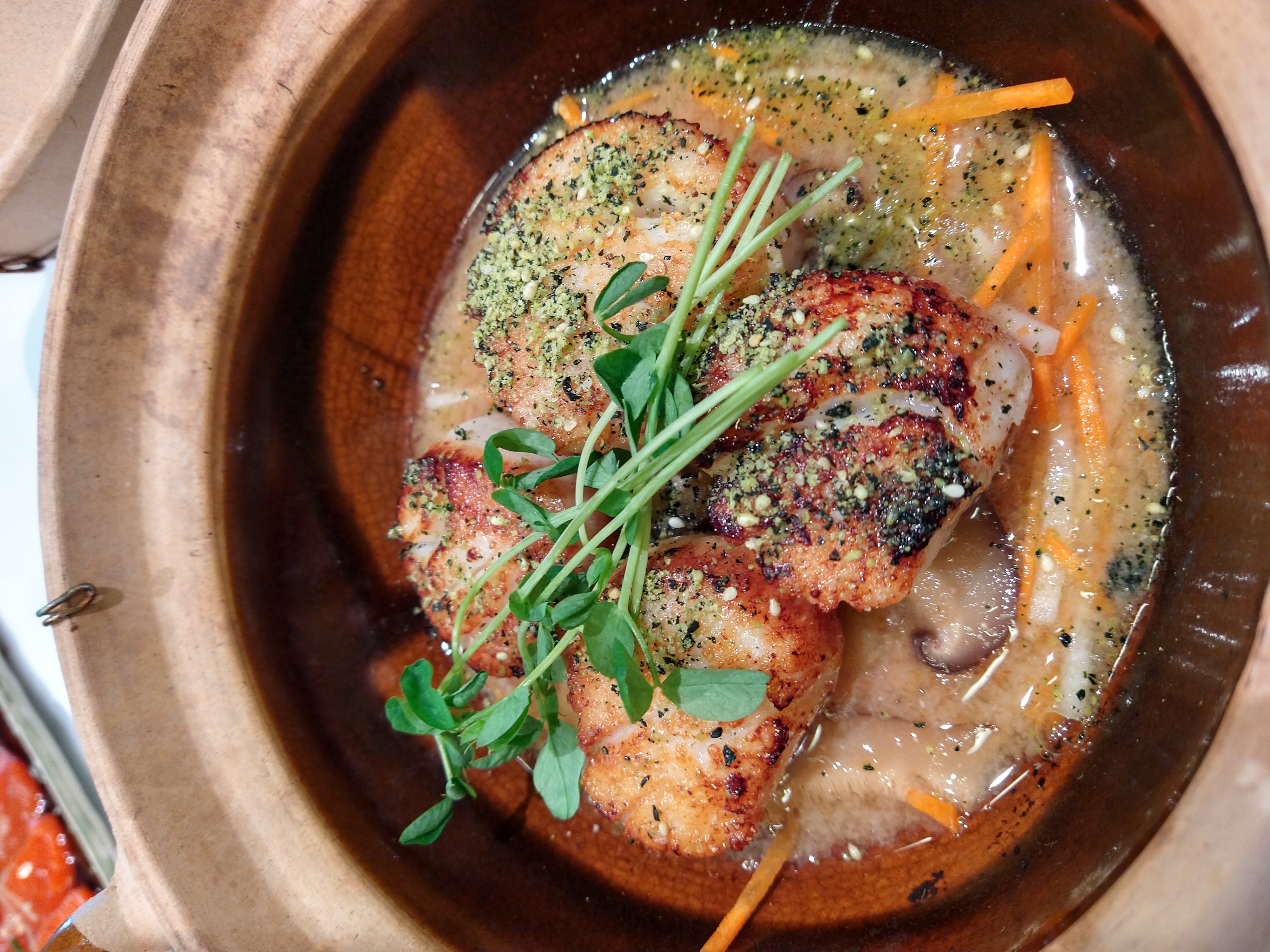 Claypot scallops in ginger broth