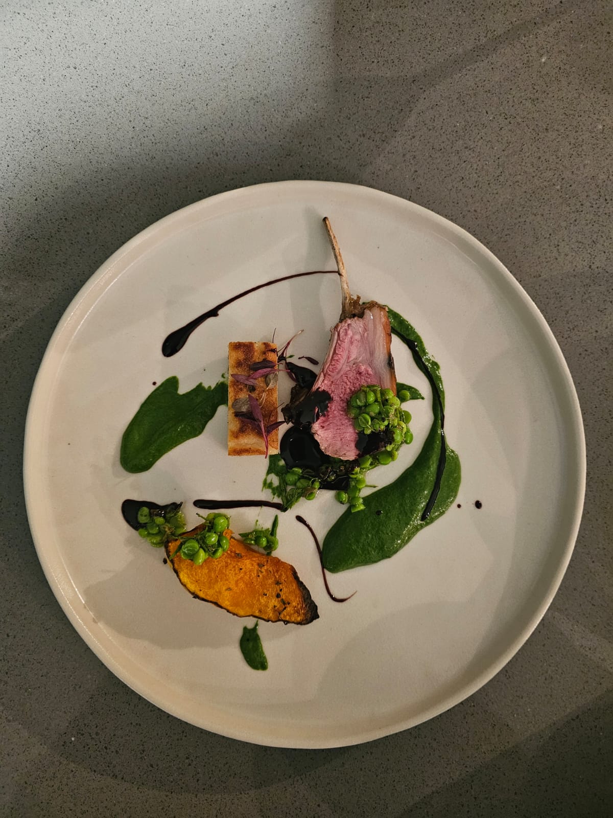 Refined plated lamb dish by Chef Wynand